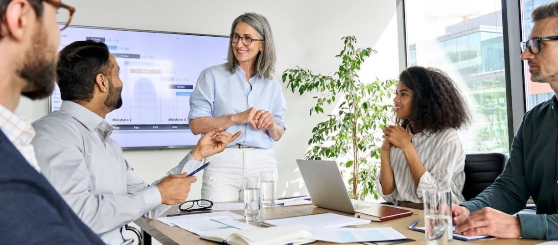 fractional marketing team discussing strategy in a boardroom